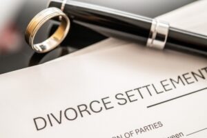 What happens if you don’t get a consent order after divorce? divorce settlement and wedding ring photo