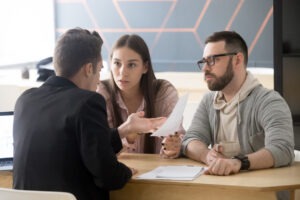 Andover Litigation & Dispute Resolution Solicitors.Hampshire lawyers. Picture of couple meeting solicitor
